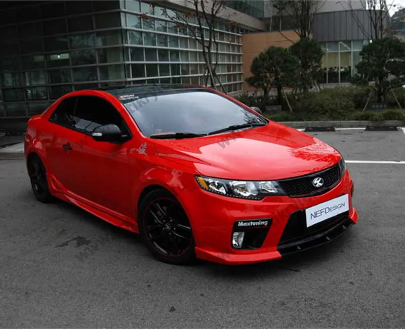 Kia Cerato Koup белая в наклейках